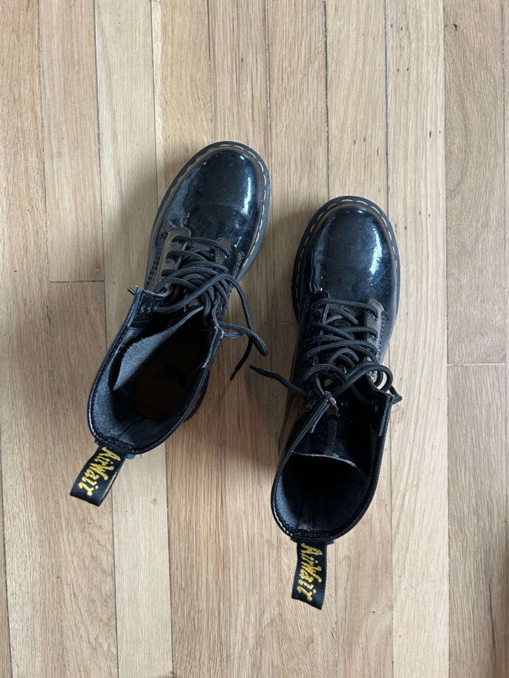 Dr. Martens Black Patent Leather Lace-Up Boots with Yellow Heel Loop